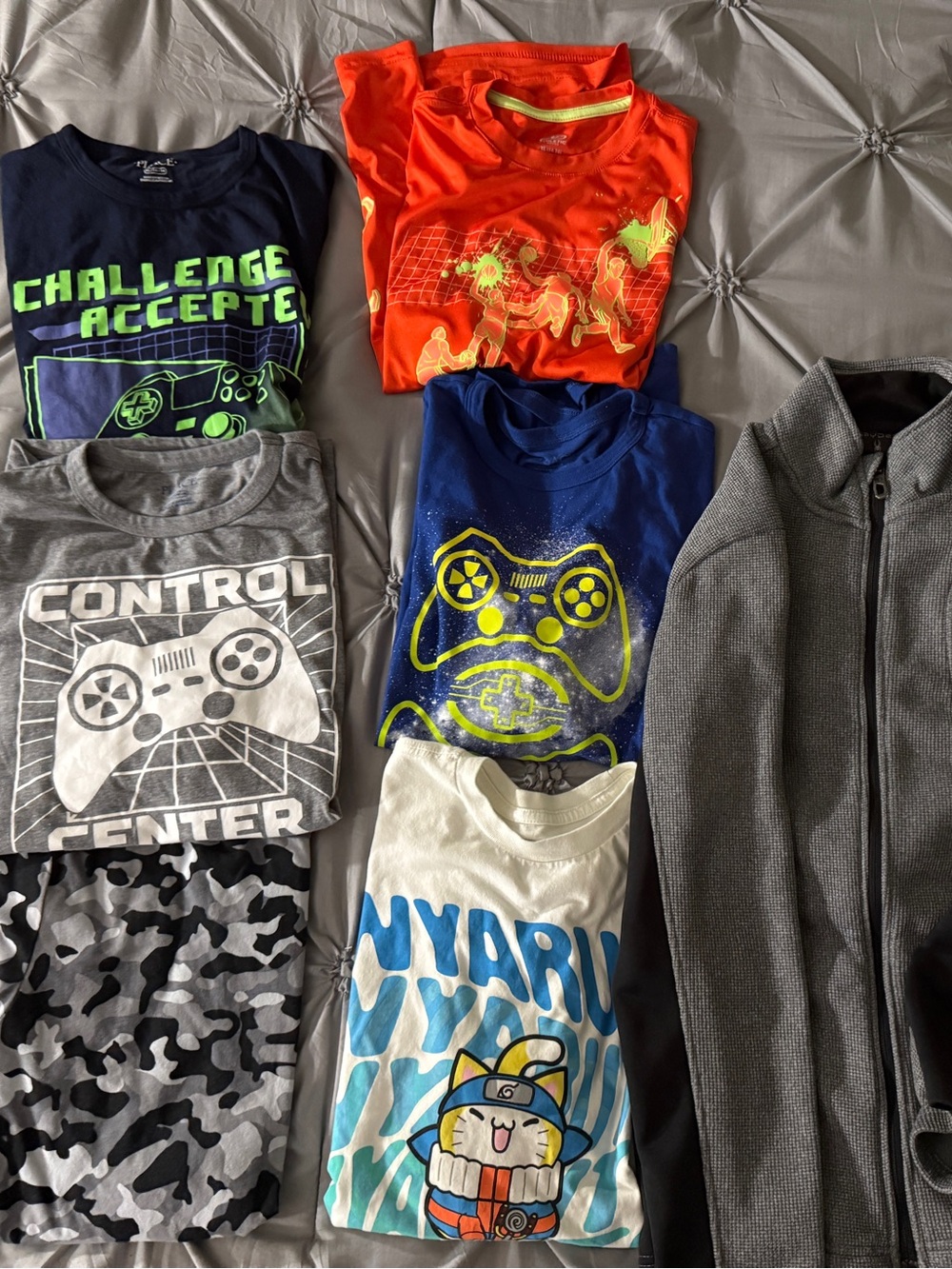 Lot of six graphic tees and one zippered Brand Spyder sweater. Size 14-16